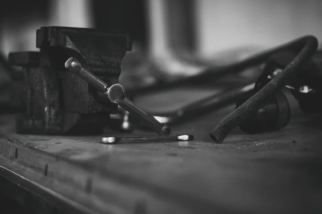 A woodworking plane resting on a bench